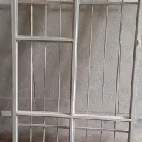 پنجره آهنی نرده دارسالم رنگ شده