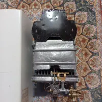 فروش یک عدد آبگرمکن دیواری بوتان B3115شمک دار