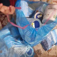 تعداد زیادی قوطی شیر خشک