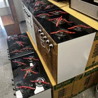 اجاق گاز پنج شعله با کابینت ملامینه طرح فر