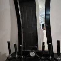 آینه و کنسول و شمعدان وساعت