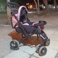 کالسکه صورتی .کالسکه دخترانه در حد نو