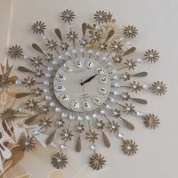ساعت دیواری طرح برنز خورشیدی