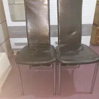 دو عدد صندلی چرم قهوه ایی تیره
