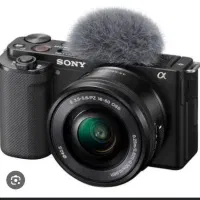 دوربین zev10 به همراه لنز سیگما 16mm
