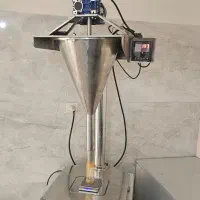 دستگاه پرکن پودر  ۱تا ۵۰۰۰ گرم سرعت بالابا گارانتی