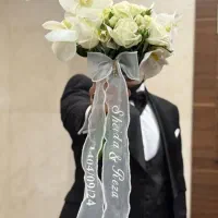 روبان دسته گل عروس به همراه اسم و تاریخ