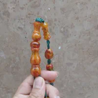 تسبیح کهربا پرچمی