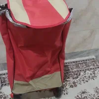 ساک خرید چرخدار آکبند نو. دارای پایه و جیب پشت