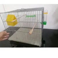 قفس پرنده با متعلاقات