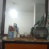 آینه دور چوب بزرگ