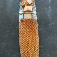 چاقو شکاری و چراغ نفتی و فلاکس و فرش وساعت