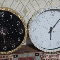 ساعت دیواری سفید و مشکی