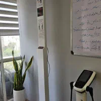 پزشک در مطب لاغری و  زیبایی