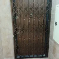 درب حفاظ آکاردئونی صنعت فولاد زنجان