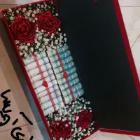 باکس گل تولدکادودسته گل پول آرایی عروسک روبانی
