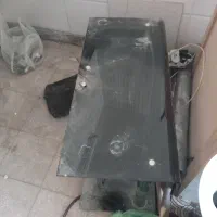 میز تلویزیون شیشه خم