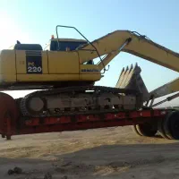 راننده بیل مکانیکی هستم