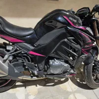 متور سیکلت نیکتاز مشکی و بنفش