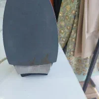 اتو سنگی قدیمی