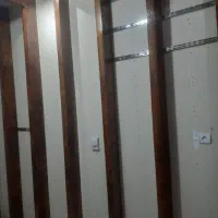 دکور مغازه با چوب راش همرا با ۲ اتاق پرو