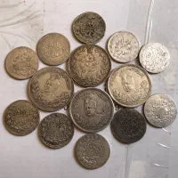 سکه اسکناس مدال ساعت کتاب مهر پول