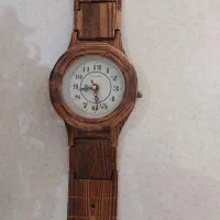 ساعت دیواری چوبی طرح مچی