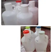 تعدادی دبه عسل دبه شیره انگور پارچ