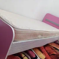 تختخواب و فرش اتاق کودک .فروتقه
