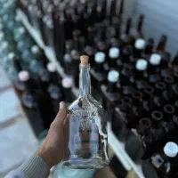 بطری شیشه‌ای گوزنی 1لیتری سفید