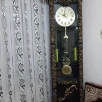 ساعت ایستاده و آینه کنسول