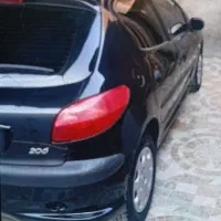 خودرو۲۰۶ مشکی آخر۹۳