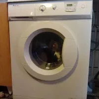 لباس شویی ابسال