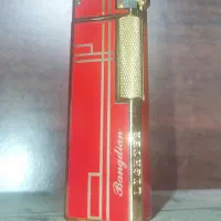 فندک بوندن کنار زن قرمز طلائی