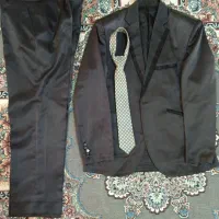 کت و شلوار مجلسی همراه با کروات