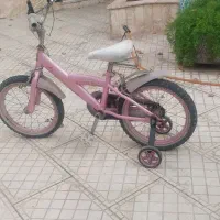 دوچرخه همراه کمکی صورتی