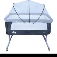 گهواره کنار تخت مادر