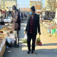 فروشنده بازار هفتگی