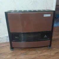 بخاری،صندلی و دو عدد قالیچه