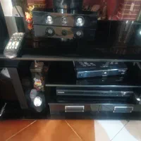میز تلویزیون شیشه ترک اصل یک در نیم
