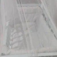 گهواره و تخت کنار مادر
