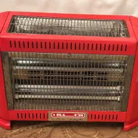 بخاری برقی فن دار و بخاری گازی بزرگ در حد آکبند