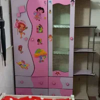 کمد کودک همراه با تخت خواب کودک وسه چرخه کودک