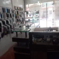دکور ویترین و تمامی لوازم موبایل فروشی