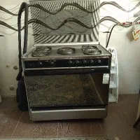 اجاق گاز فر دار سینجر