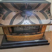 یک عدد فرش و بخاری