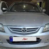 مزدا ۳۲۳ بیمه تا برج ۷