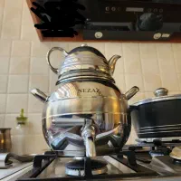 قابلمه چدن و سرویس روحی ،کتری و قوری ،سوفله خوری