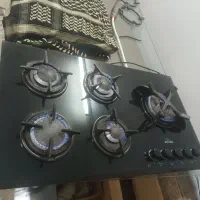 اجاق گاز پلوپز کنار شعله قارچی