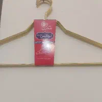 چوب لباسی فلزی طلایی